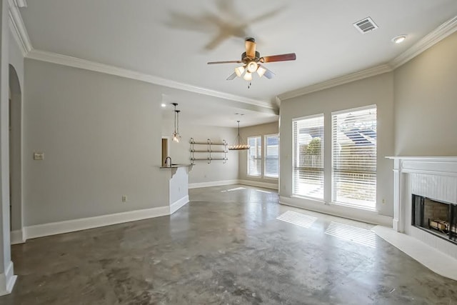 unfurnished living room featuring crown molding and ceiling fan