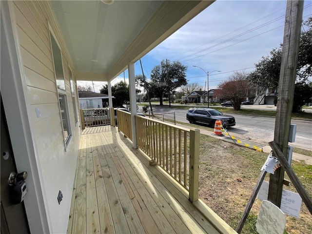 wooden deck featuring a porch