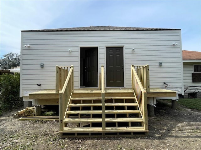 rear view of property with a deck