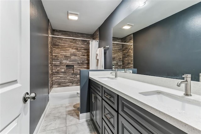 full bathroom featuring vanity, toilet, and shower / tub combo with curtain