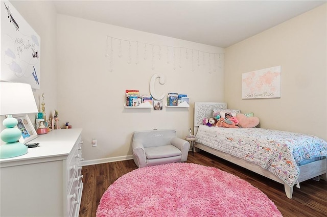 bedroom featuring dark wood-type flooring