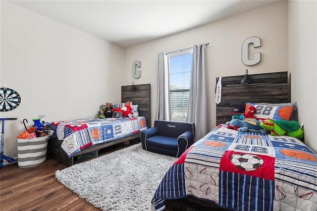 bedroom featuring hardwood / wood-style flooring