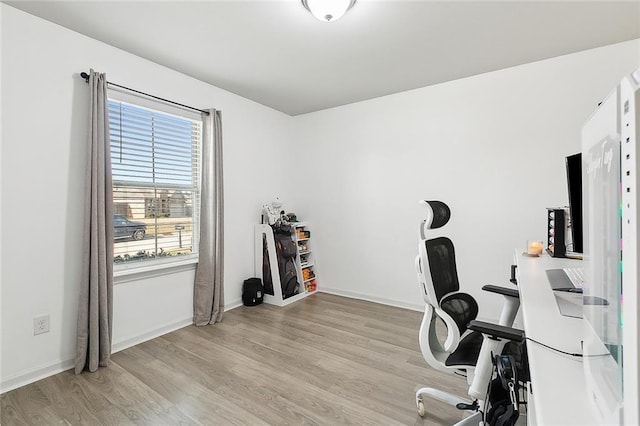 office area with light wood-type flooring