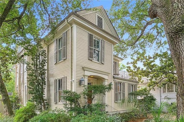 view of property exterior featuring a balcony