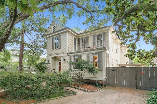 view of front of home with a balcony