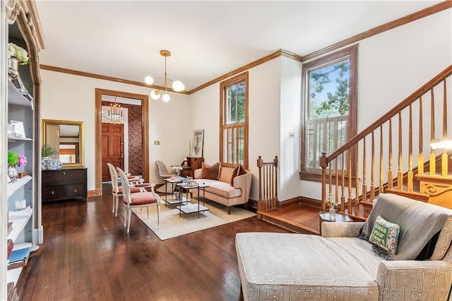 living room featuring a notable chandelier, crown molding, and dark hardwood / wood-style floors