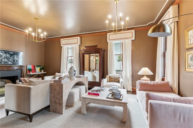 living room featuring a chandelier, crown molding, and a wealth of natural light