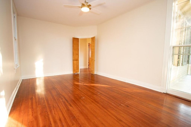 spare room featuring ceiling fan and wood-type flooring