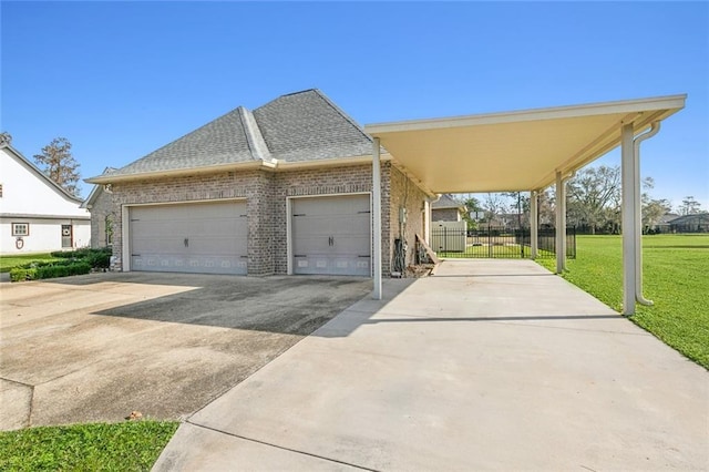 view of front of house with a front yard and a carport