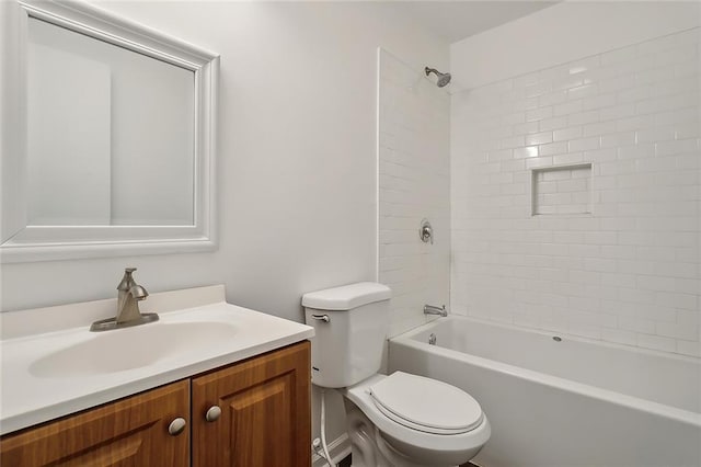 bathroom with shower / bathtub combination, toilet, and vanity