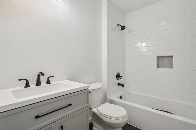 full bath featuring vanity, toilet, and shower / bath combination