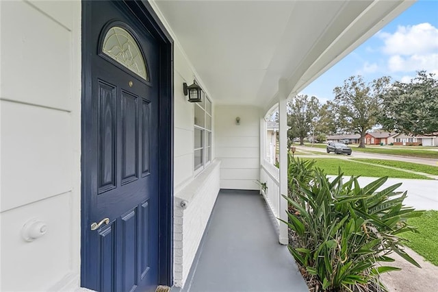 entrance to property with a porch