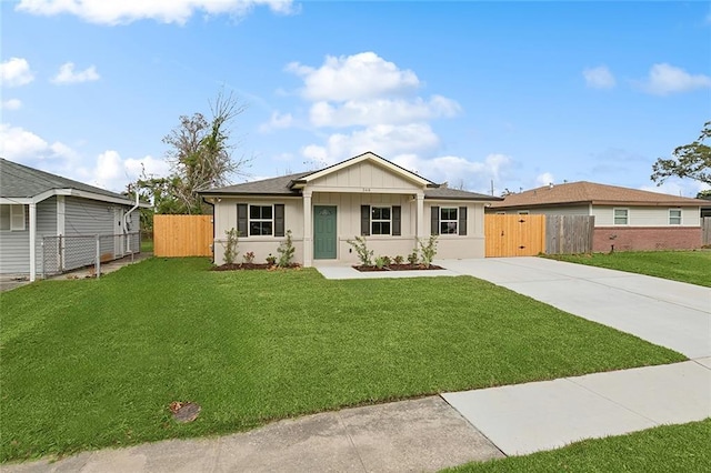 ranch-style home with a front yard