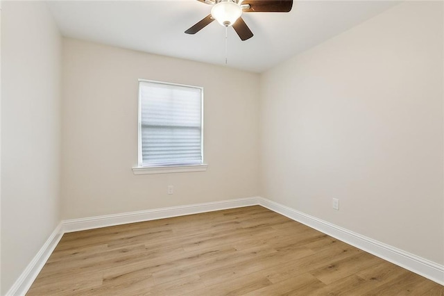 spare room featuring ceiling fan and light hardwood / wood-style floors