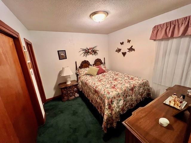 carpeted bedroom with a textured ceiling