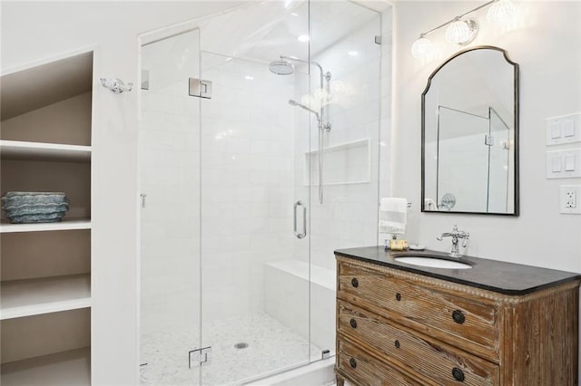 bathroom featuring vanity and walk in shower