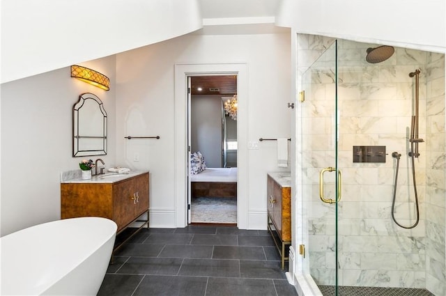 bathroom featuring vanity and shower with separate bathtub