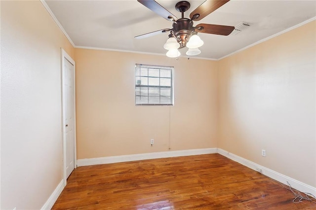 unfurnished room featuring wood-type flooring, ceiling fan, and crown molding