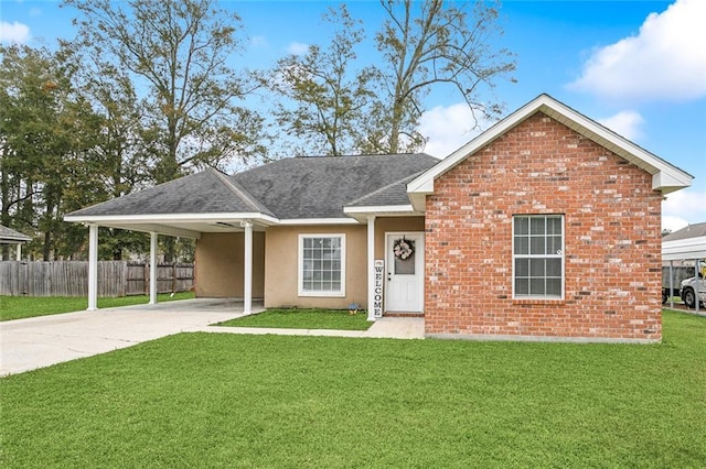 view of front facade featuring a front lawn and a carport