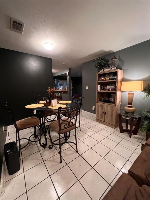 view of tiled dining area