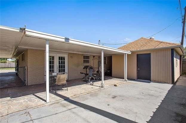 rear view of property featuring a patio