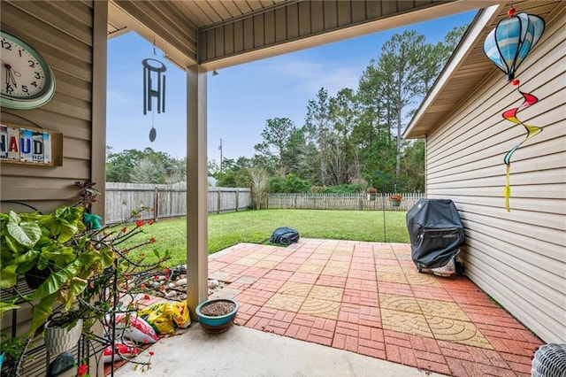 view of patio with a grill