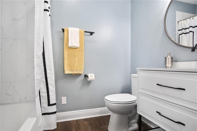 full bathroom with shower / bath combo, vanity, toilet, and wood-type flooring