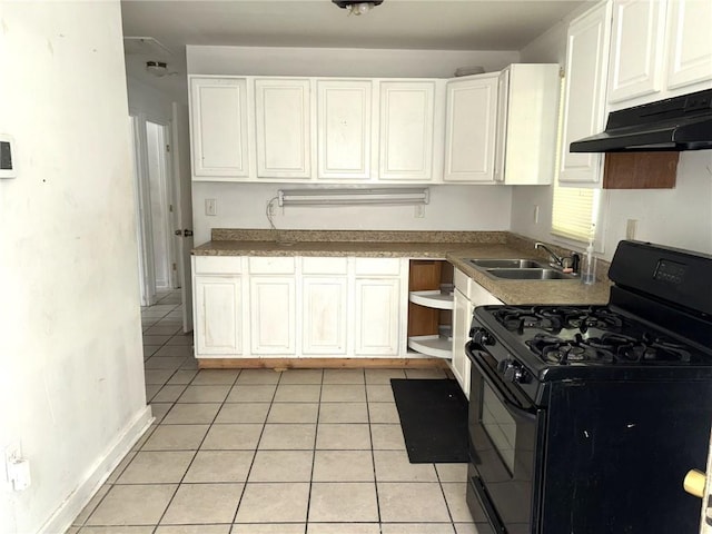 kitchen featuring black range with gas stovetop, white cabinetry, sink, and light tile patterned floors