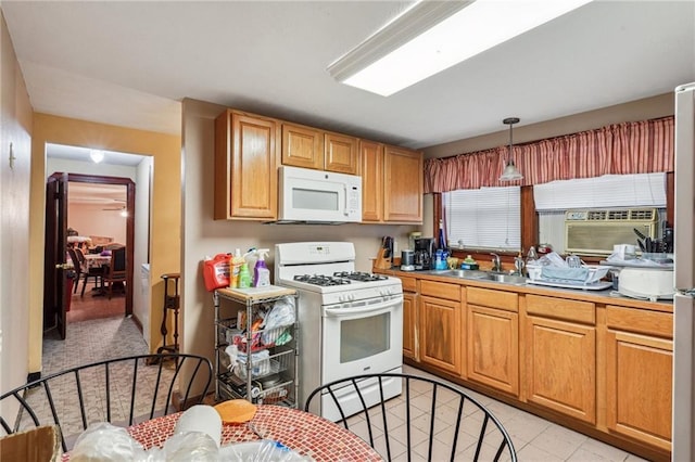 243335 Ursulines Ave, New Orleans, LA 70119 - kitchen featuring sink, white appliances, cooling unit, hanging light fixtures, and light tile patterned flooring