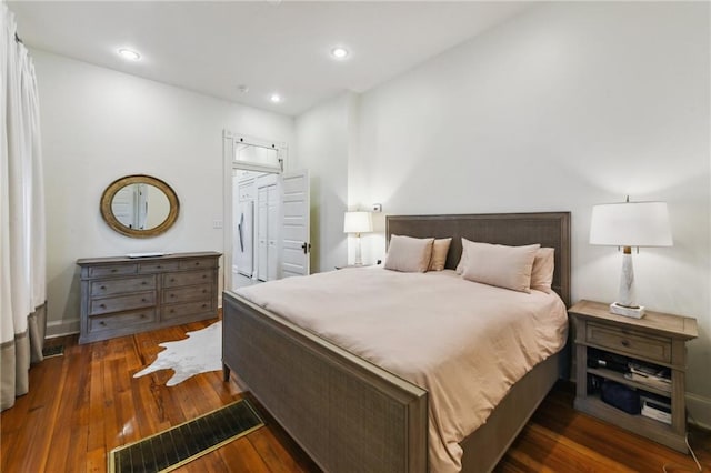 bedroom featuring dark wood-type flooring