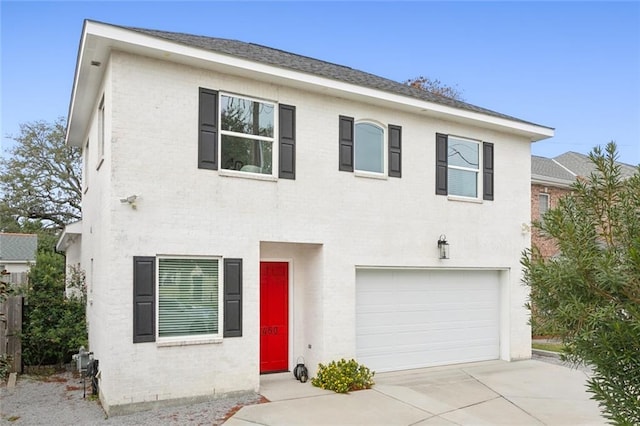 view of front of home with a garage