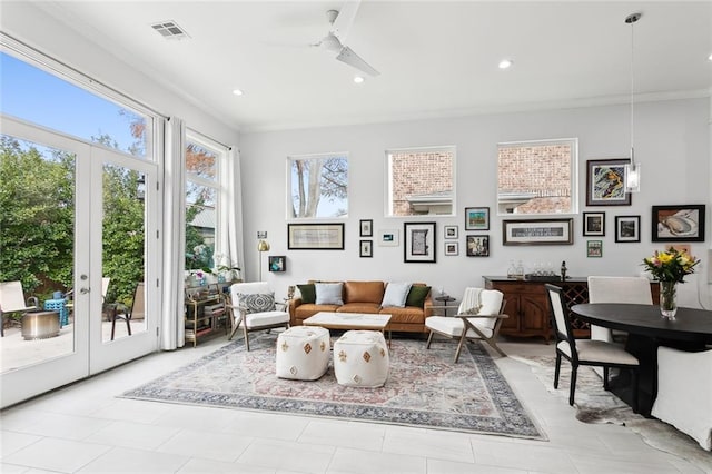 interior space with french doors and ceiling fan