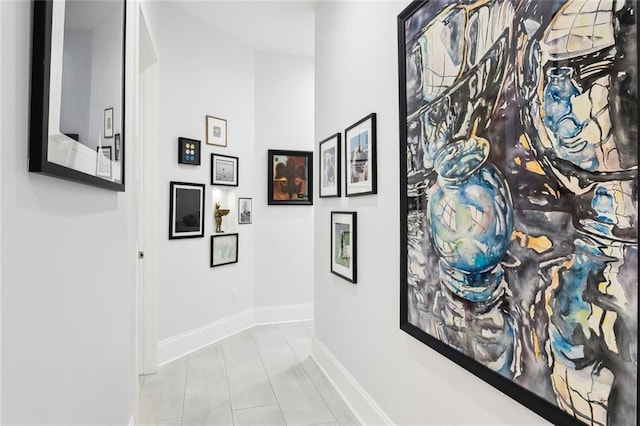 hallway with light tile patterned flooring