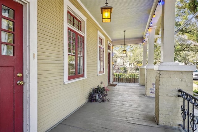 wooden terrace with covered porch