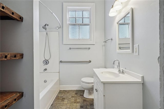 full bathroom with vanity, toilet, and washtub / shower combination