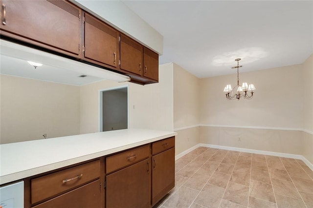 kitchen featuring a chandelier and decorative light fixtures