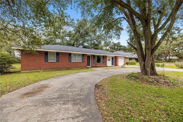 ranch-style home featuring a front yard