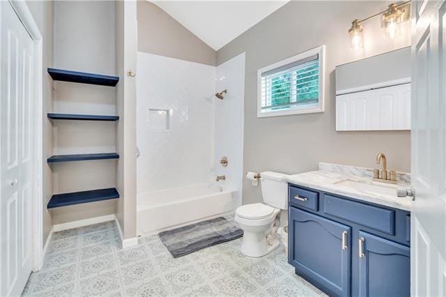 full bathroom featuring vanity, toilet, lofted ceiling, and shower / washtub combination