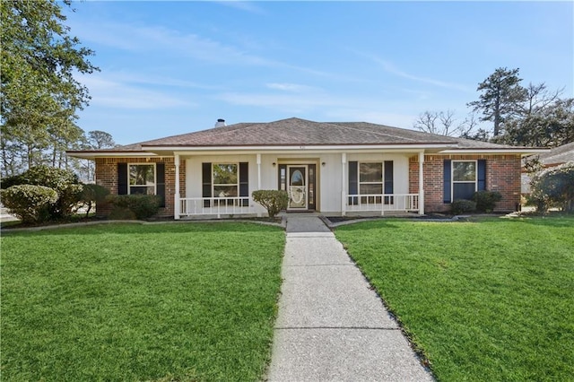 ranch-style home featuring a front yard and a porch