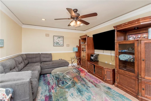 tiled living room featuring ceiling fan and crown molding