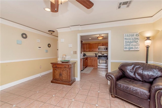 living room featuring crown molding, light tile patterned floors, and ceiling fan