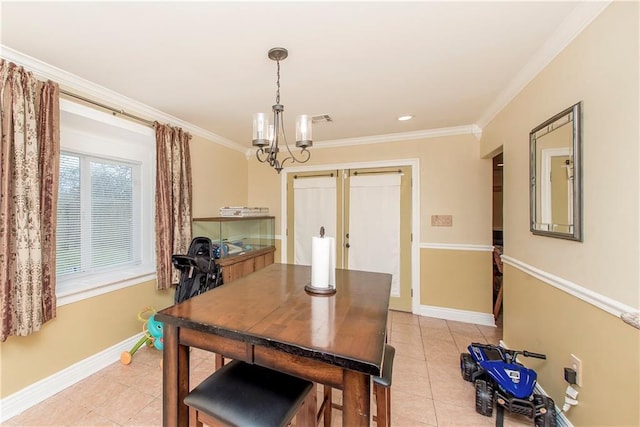 tiled dining area featuring crown molding and a chandelier