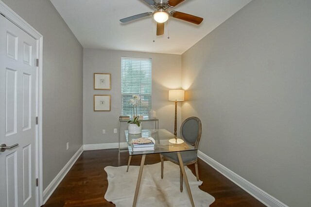 office area featuring dark hardwood / wood-style floors and ceiling fan