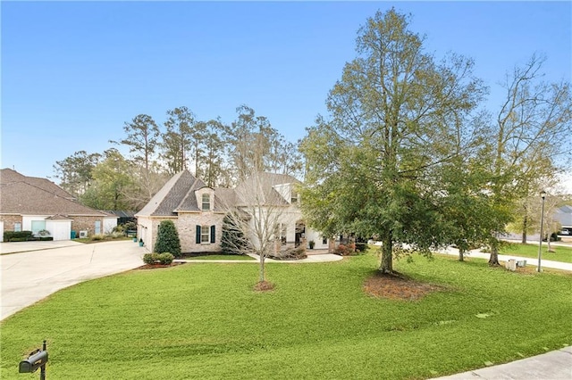 view of front of home with a front yard