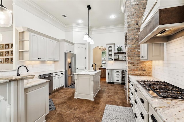 kitchen with a kitchen island with sink, sink, light stone countertops, appliances with stainless steel finishes, and custom range hood