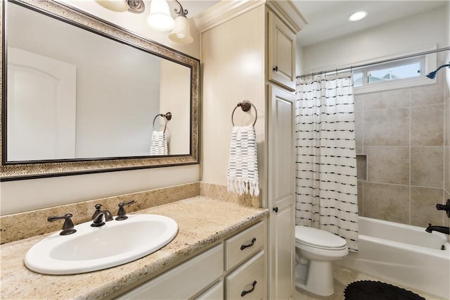 full bathroom with vanity, toilet, and shower / bath combo with shower curtain