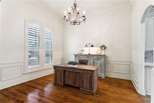 office space with a chandelier, dark hardwood / wood-style floors, and ornamental molding