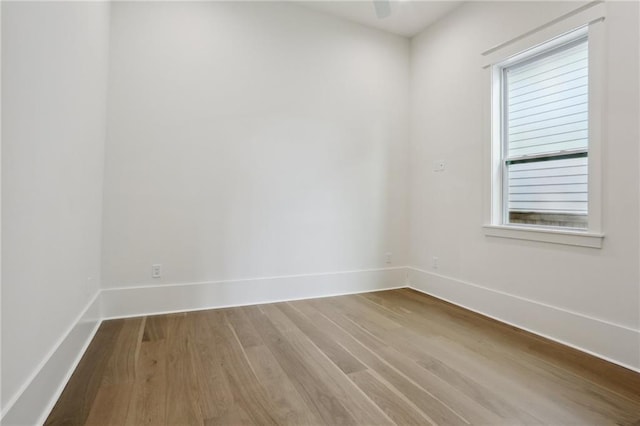 empty room featuring hardwood / wood-style floors