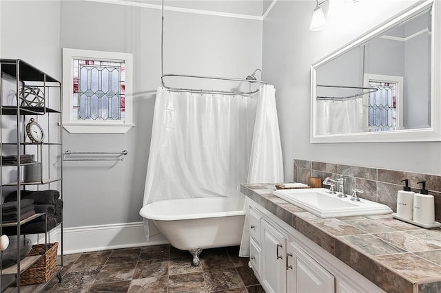 bathroom featuring vanity, shower / bath combo, backsplash, and ornamental molding