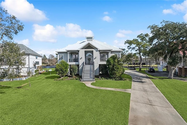 view of front of house with a front lawn